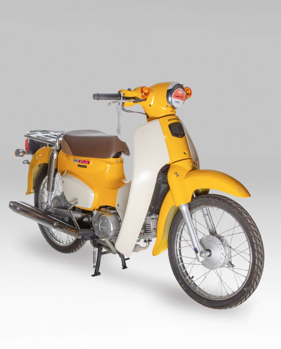 Honda Super Cub geel - 4397 km.